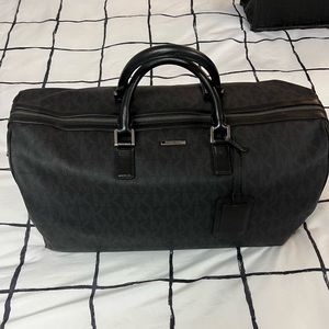 Michael Kors, duffel bag with toiletry travel bag